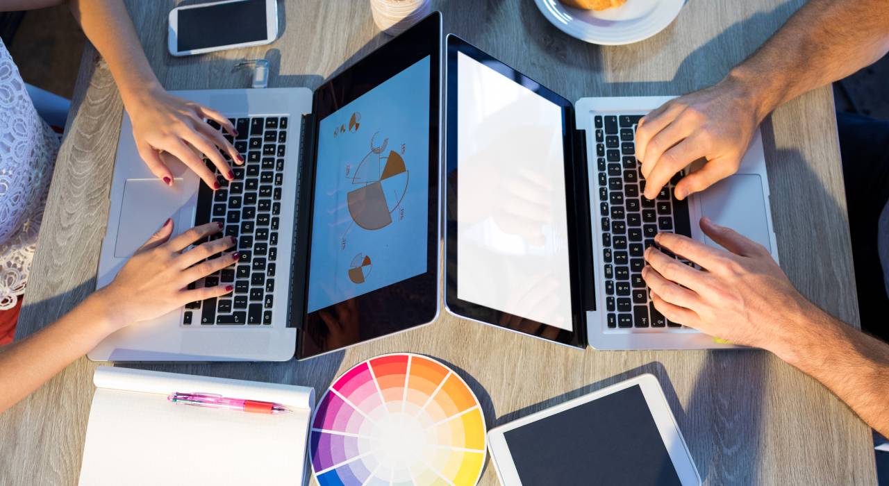 executives-using-laptop-at-their-desk